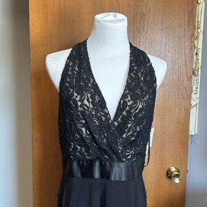 Black 𝅺embroidered halter cocktail dress size 12.